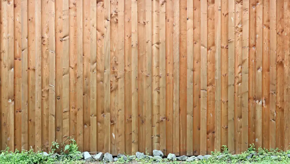 how to hang flower baskets on fence